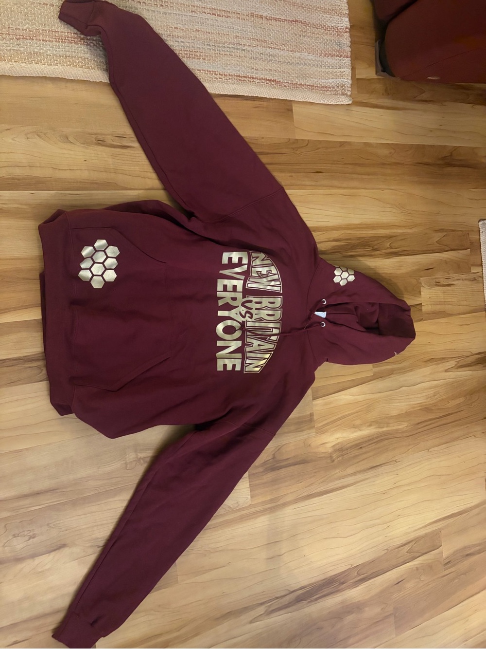 Maroon Pullover Hoodie with Metallic Print “New Britain Vs. Everyone” women’s XL